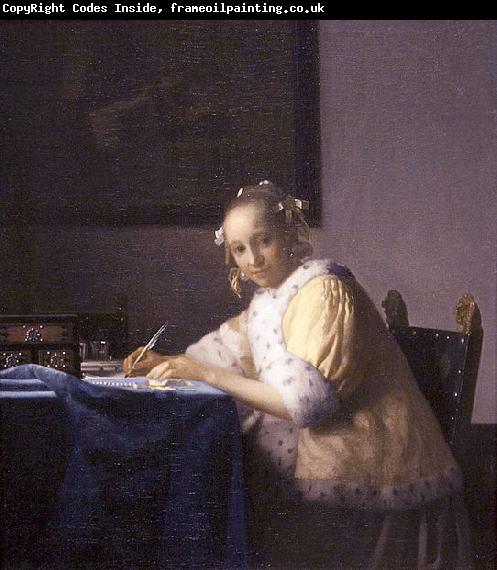 Johannes Vermeer A lady writing.
